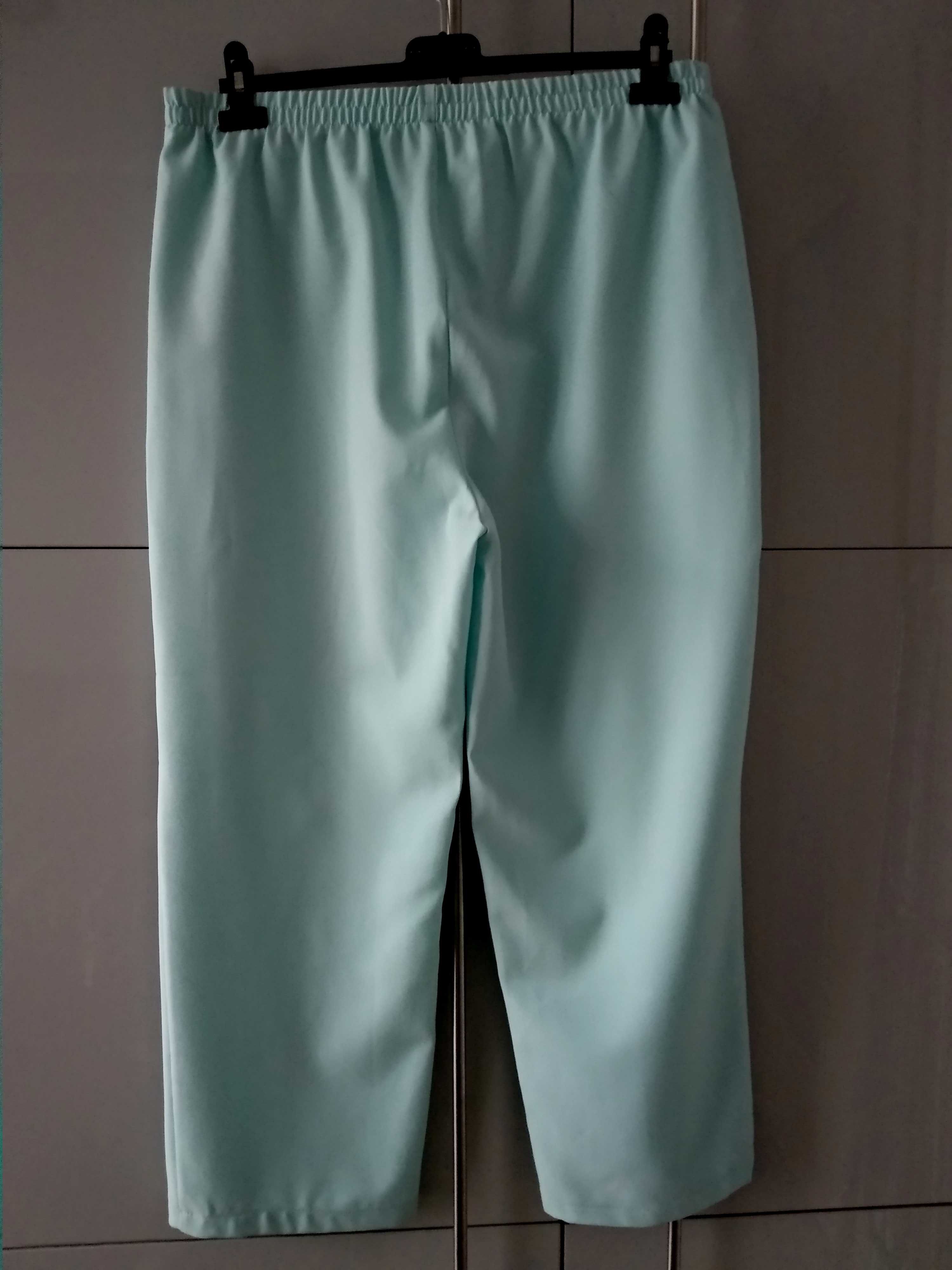 Spodnie materiałowe, niebieskie, rozmiar 42, pas 88 cm.
