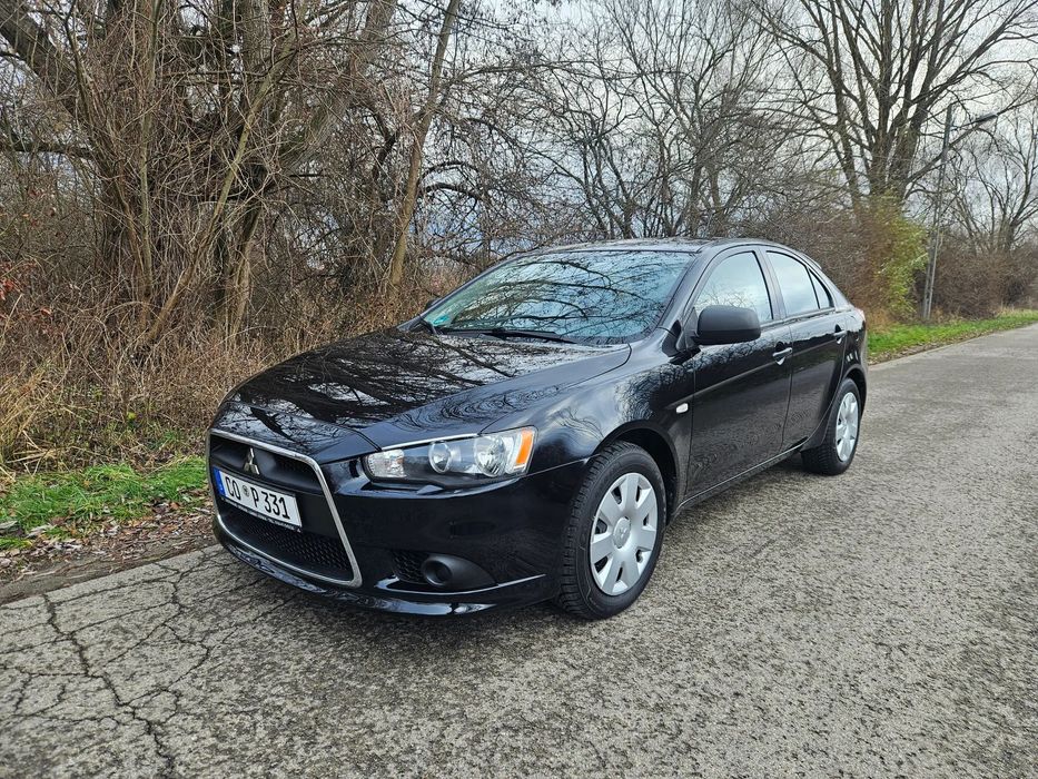 Mitsubishi Lancer Piękny_1.8_143PS_119.000km_klima_z_Niemiec_Bezwypadkowy