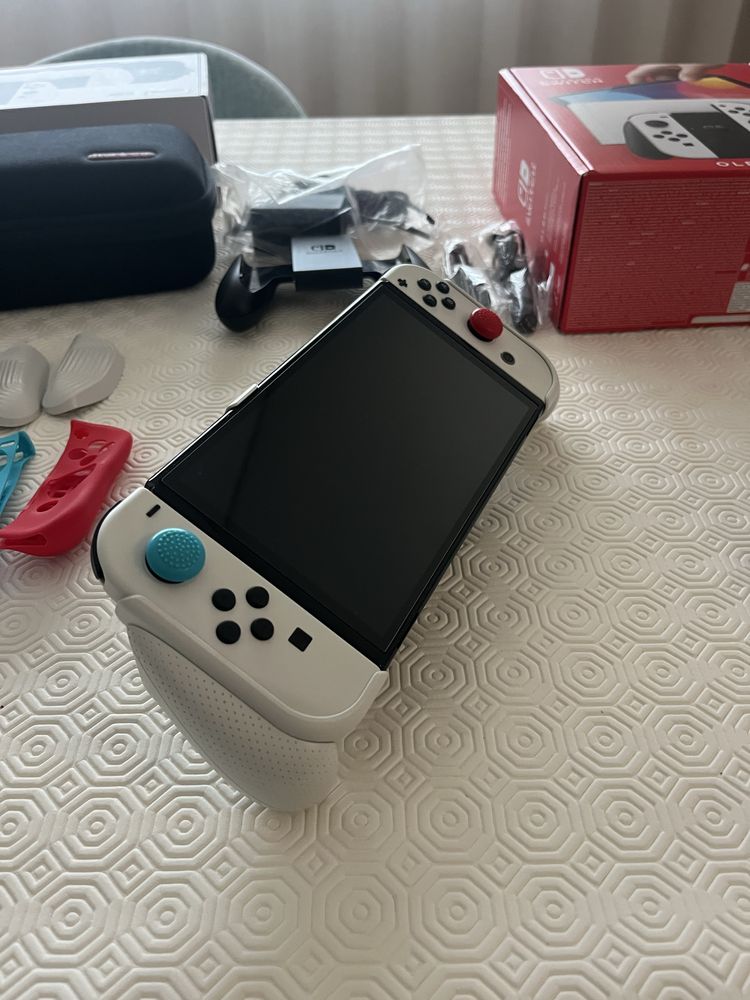 Nintendo switch oled + skull & go + acessorios