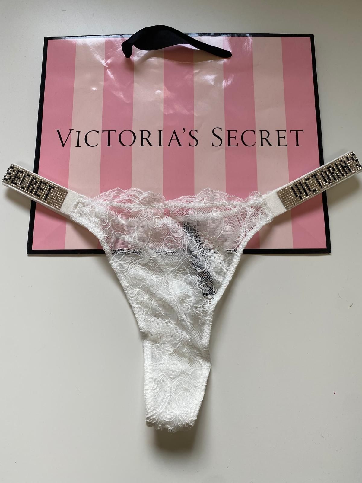 Stringi białe koronkowe Victoria Secret rozmiar M 35cm na płasko
Wys