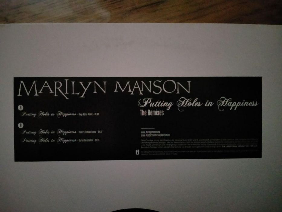 Marilyn Manson ‎– Putting Holes In Happiness
