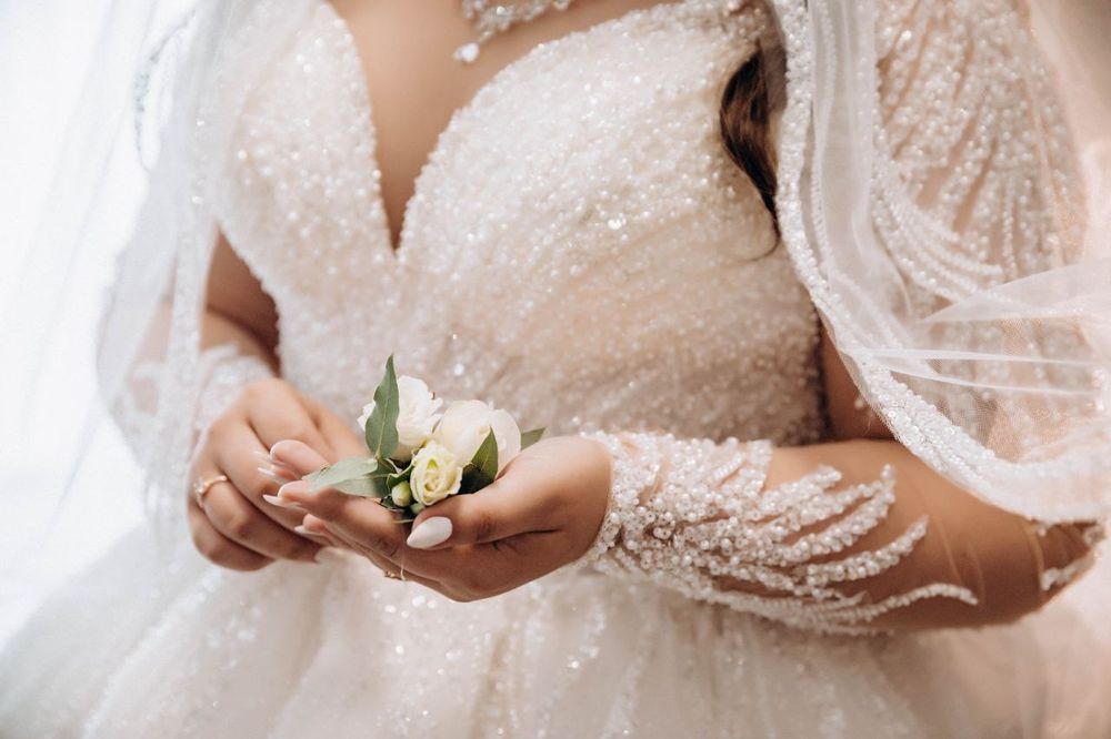 Весільне плаття з шлейфом