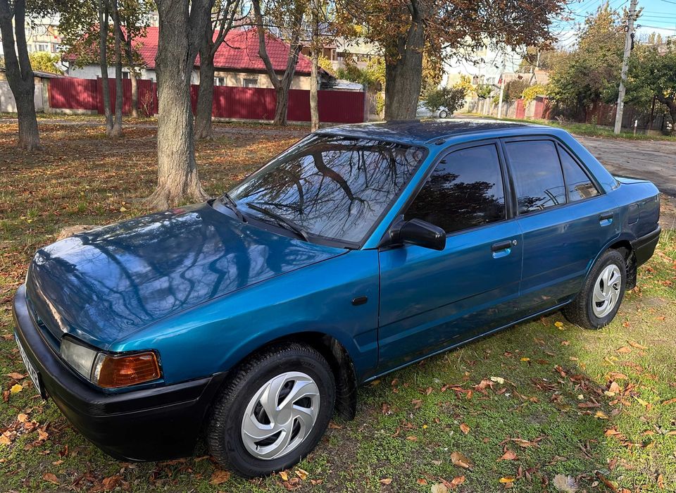 Mazda 323 расход 7л/100км