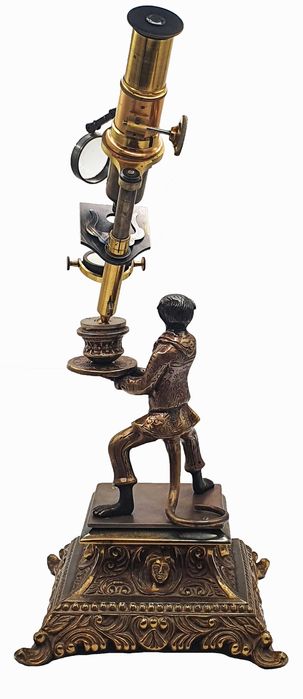 Brass reproduction of a “monkey microscope”