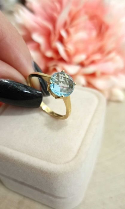 Złoty pierścionek p.585/2,17g Błękitna cyrkonia