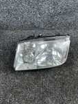 vw bora reflektor lampa lewy przód lewa przednia hella OE