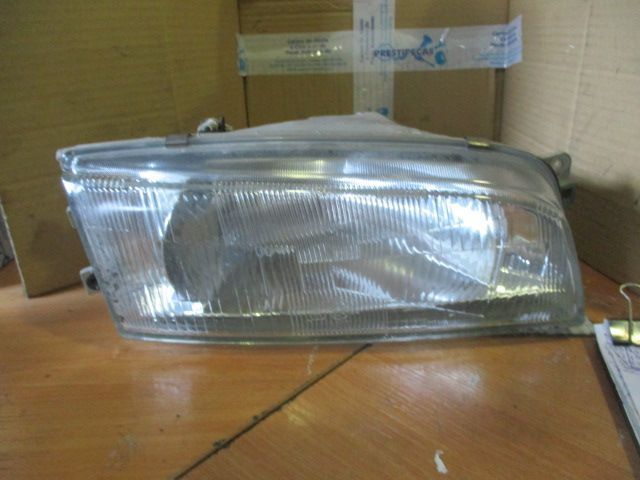 Farol FAR961 MITSUBISHI LANCER 1997 DRT H4