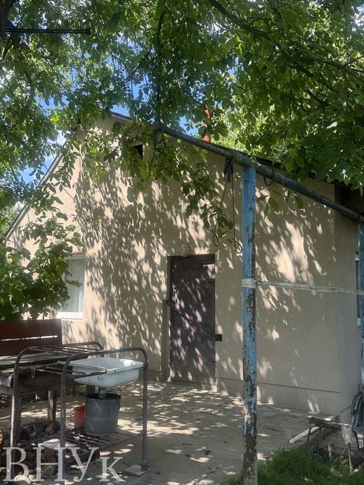 Земельна ділянка в межах Луцька з будинком!