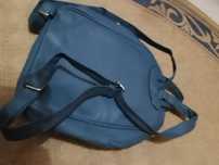 Mochila nova cor azul petróleo muito espaçoso