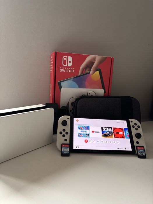Nintendo Switch OLED + białe Joy-Cony + gry + Nitro Deck