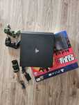 Konsola PS4 Slim 1 GB 2x pad, ładowarka
