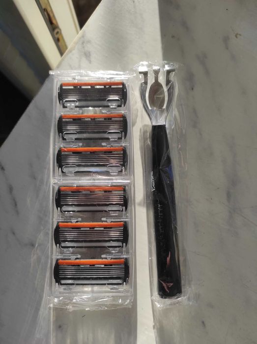 Набір для Гоління "Ergotrim" (станок та 6 змінніх картриджів)