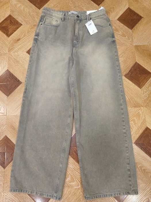 Нові широкі джинси від House