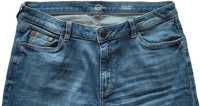Męskie jasnoniebieskie jeansy, spodnie W42 L44.