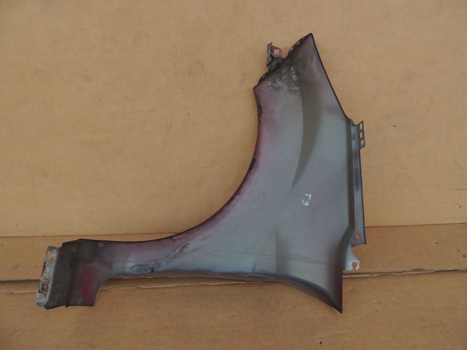 Błotnik przedni prawy Ford Fiesta MK7 08,09,10,11,12,13,14,15,16,17 T9