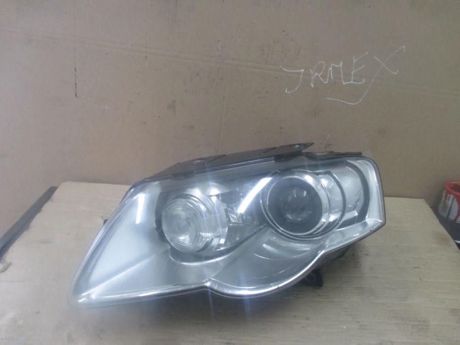 lampa lewa Passat B6 Xenon Valeo Europa
