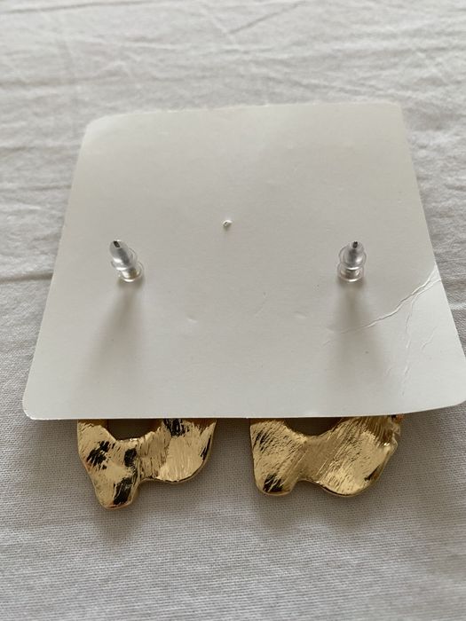 Brincos dourados ovais Shein