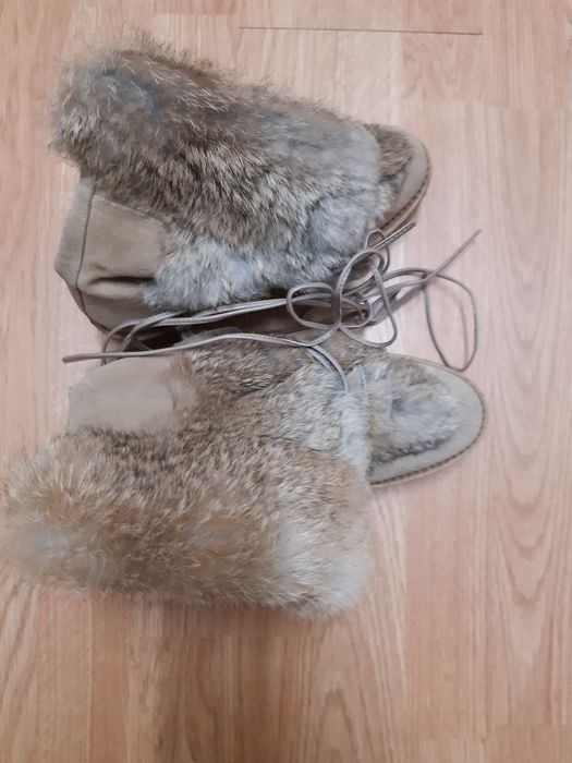 Botas de neve em pele  - em estado novo