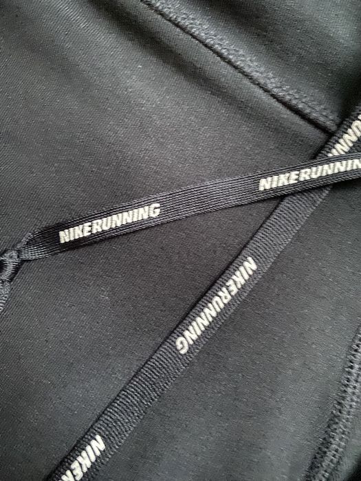 Damskie legginsy getry spodenki 3/4 sportowe do biegania Nike roz. S