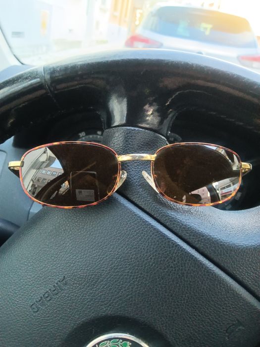 Óculos de sol por5€marca oggi comprados ótica para desocupar