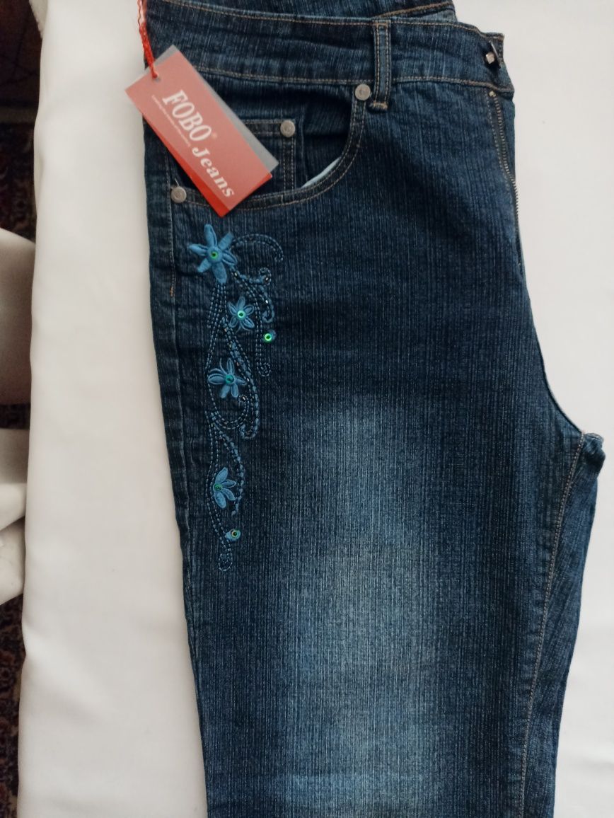 Продам женские джинсы с вышивкой 54 размер