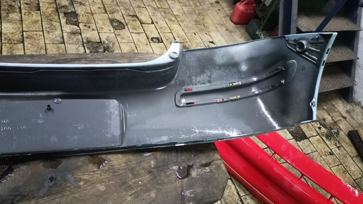 Toyota Yaris I Lift rok 2003 - 05 zderzak tylny