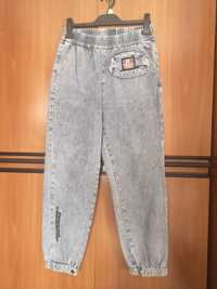 Szare marmurkowe jeansy typu jogger L