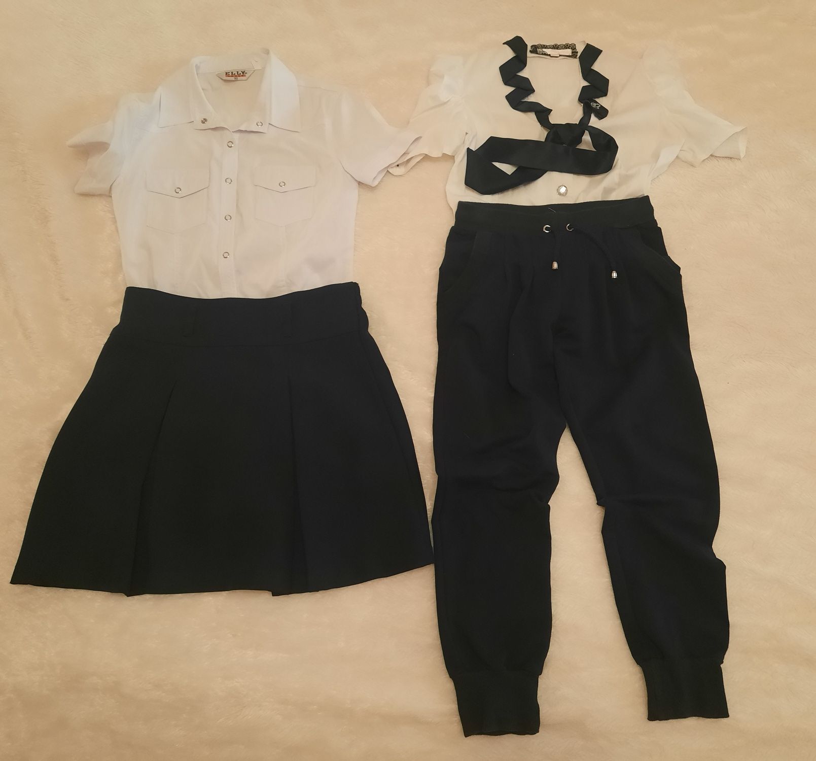 Комплекты летней одежды на девочку р.134-140