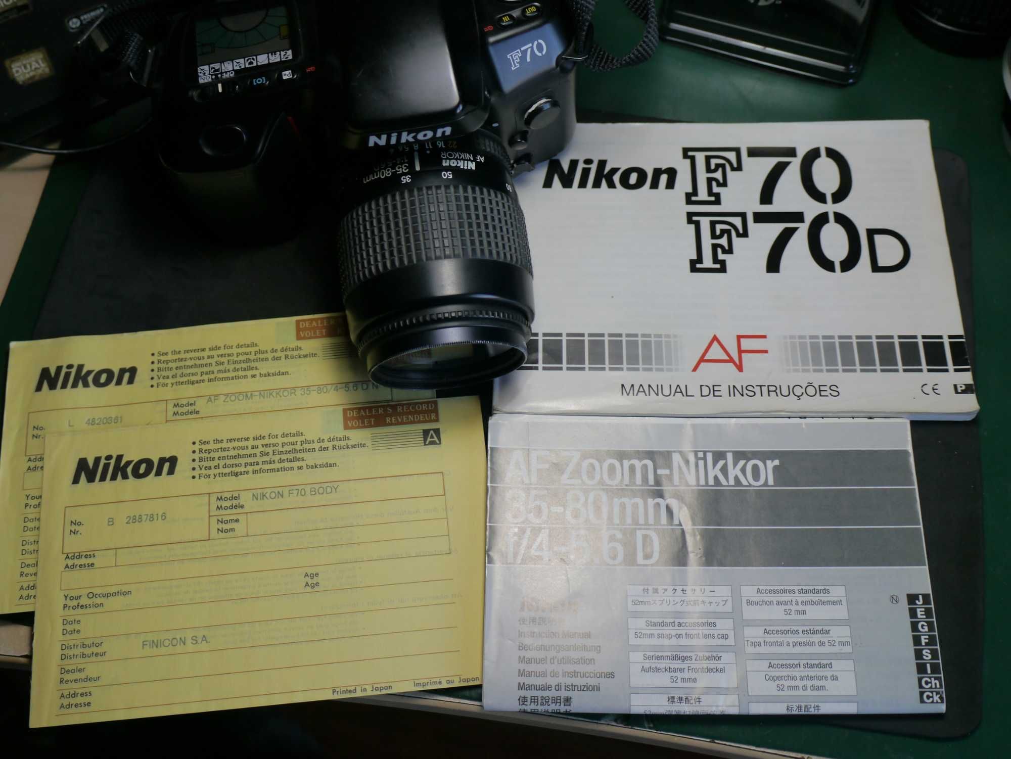 Conjunto Nikon AF camera e lente com manuais