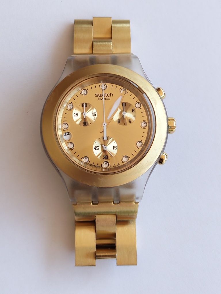 Vendo relógio dourado Swatch