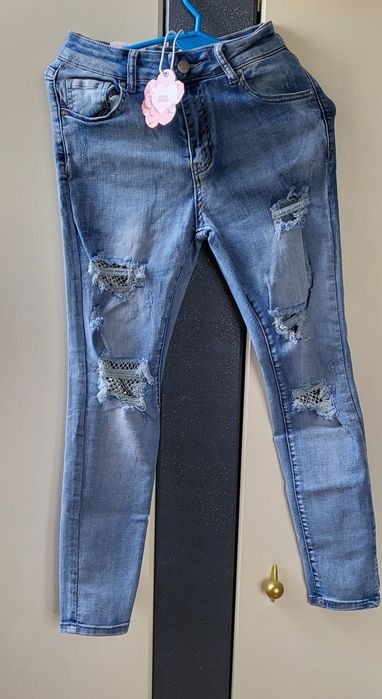 Jeansy MONDAY Premium dziury ,cyrkonie