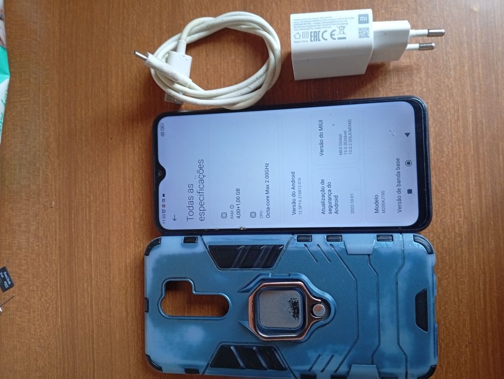 Xiaomi Redmi 9 com acessórios