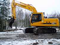 Koparka - wykopy - wyburzenia - transport