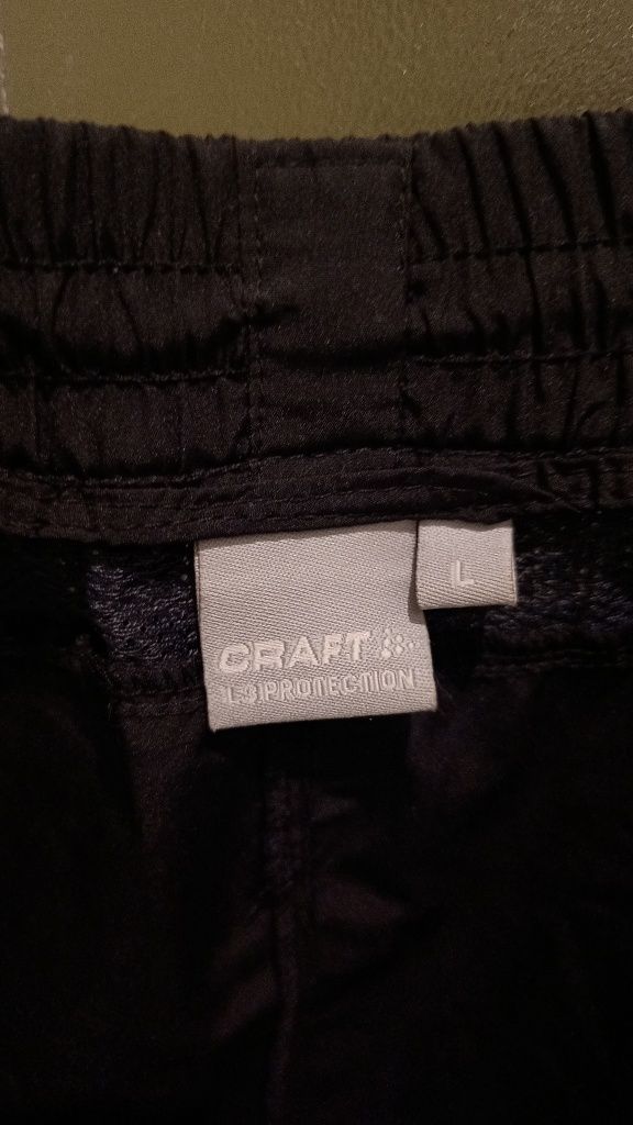 NOWE Craft Szwedzkie męskie spodnie sportowe windstoppery, Rozmiar L