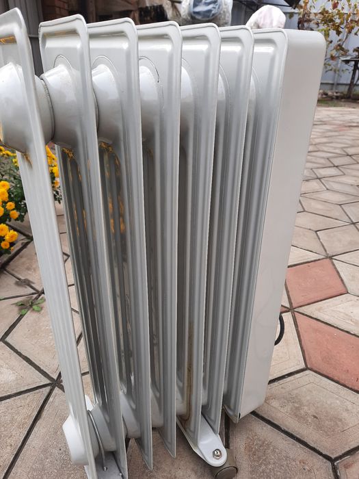 Масляый обогреватель, електрорадиатор