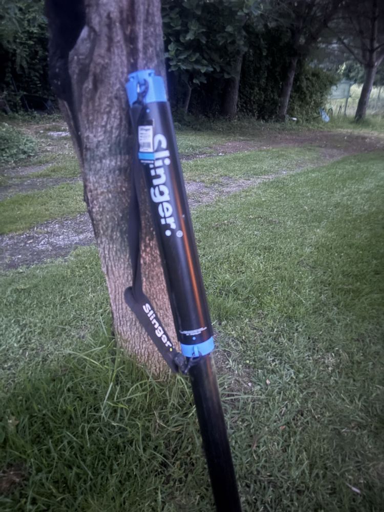 Maquina de lançar bolas de tenis marca Slinger
