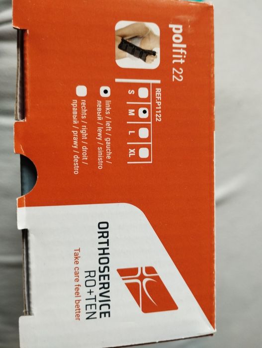 Temblak siatkowy i orteza na lewą rękę