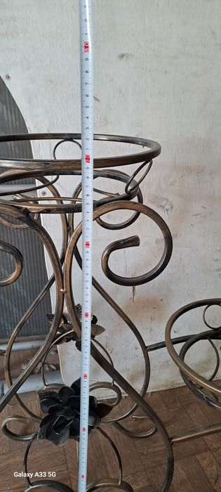 Стійка для одягу та квітів