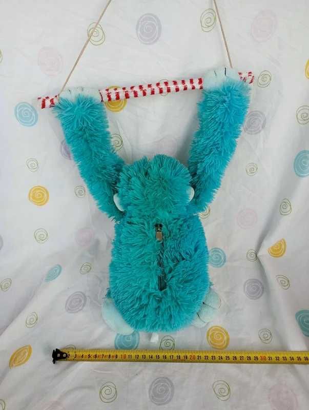 Macaco peluche com camera