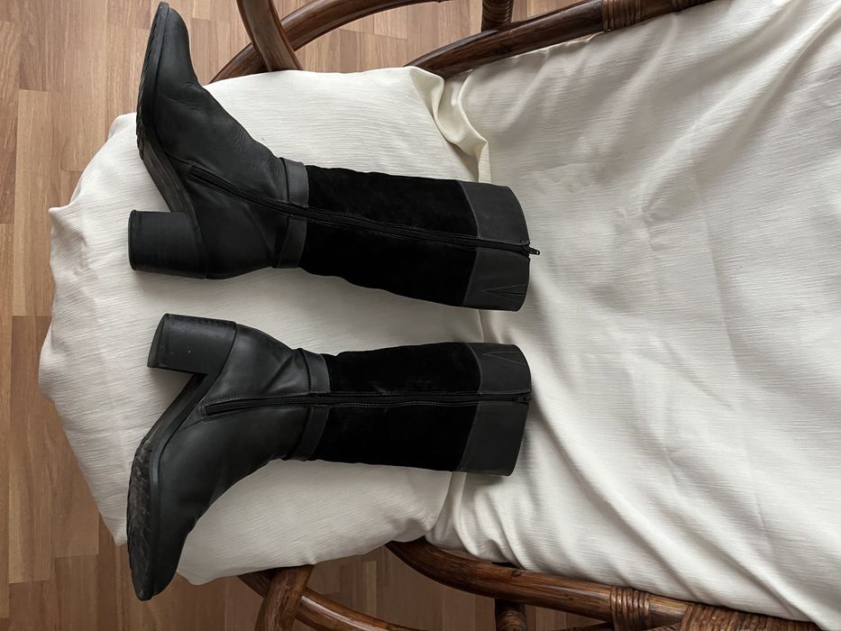 Botas pretas de cano alto