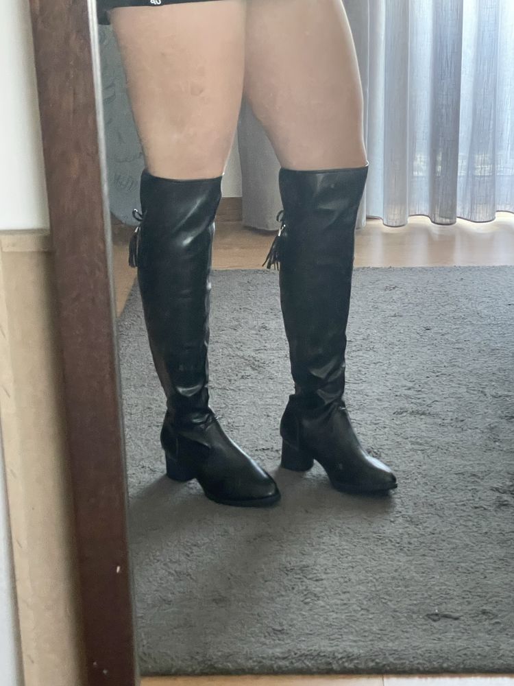 Botas acima do joelho