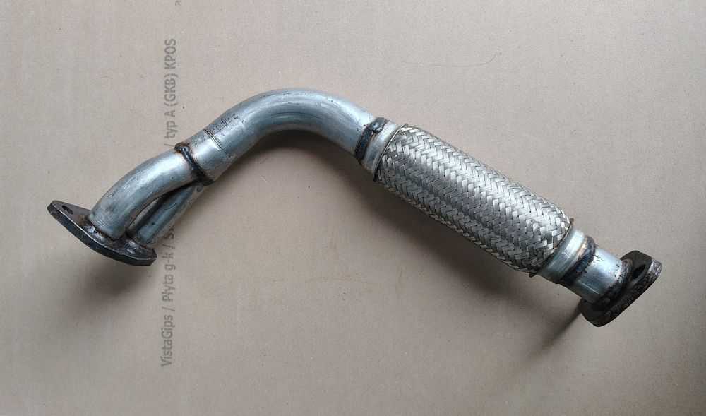 прийомна труба Mazda 323/323F