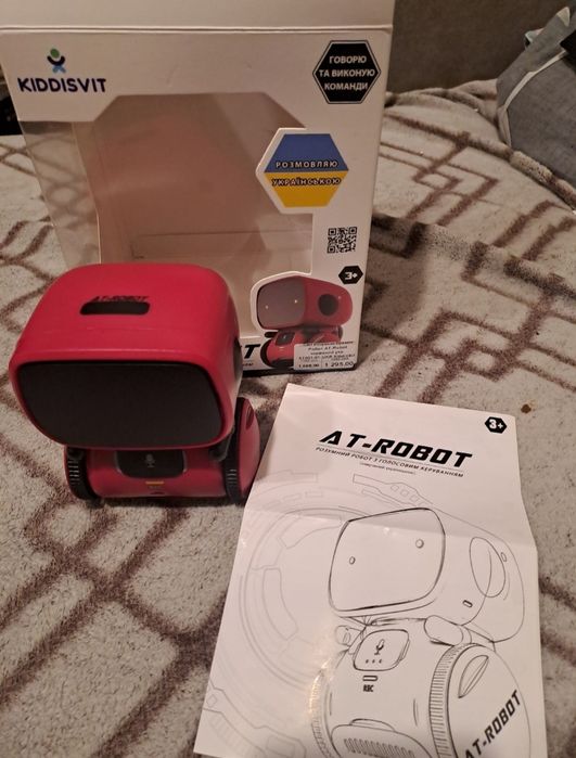 Продам б/у іграшки динозавр та іт- робот