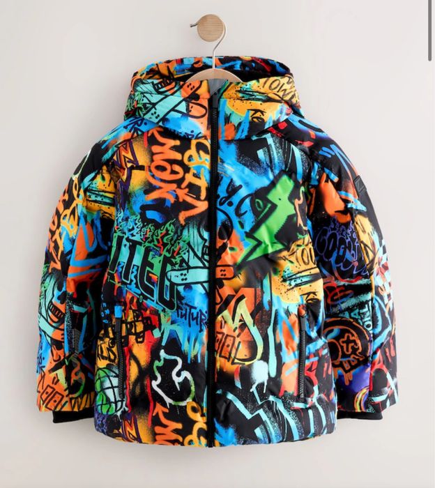 Яскрава зимова куртка Next в наявності