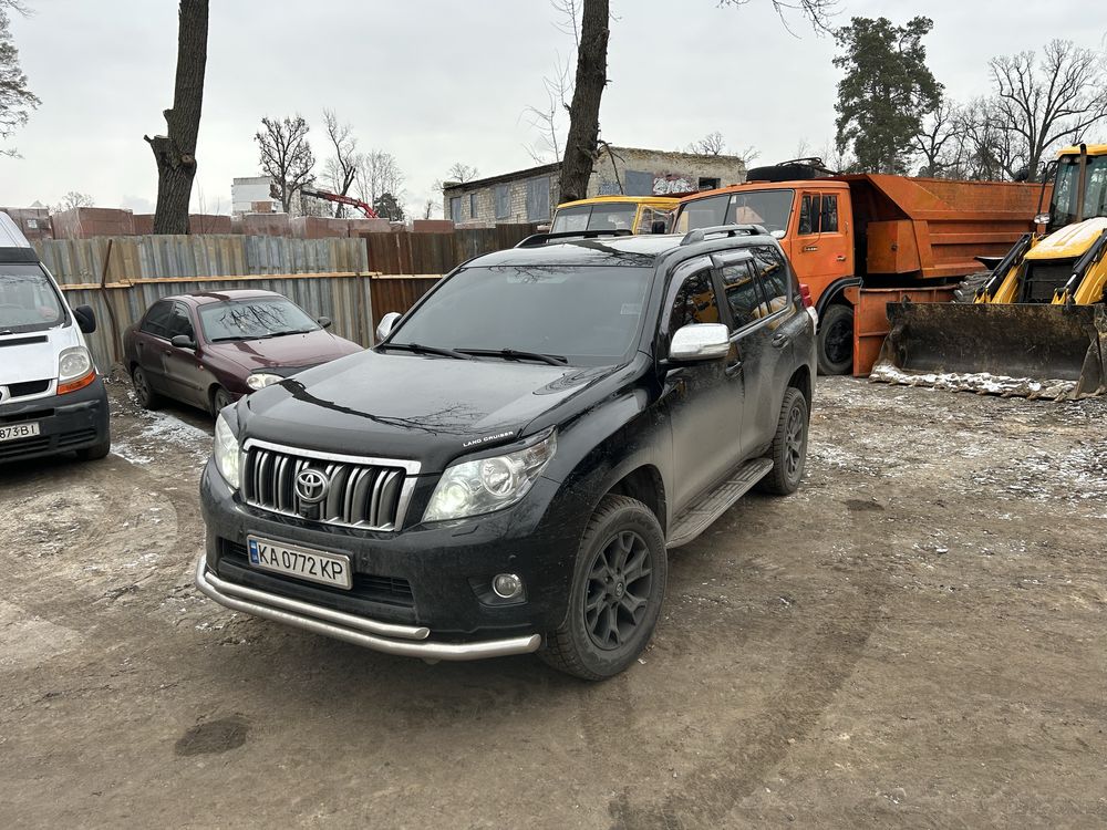 Обмін свого автопарку самоскидів та Прадо на нерухомість  Київ область