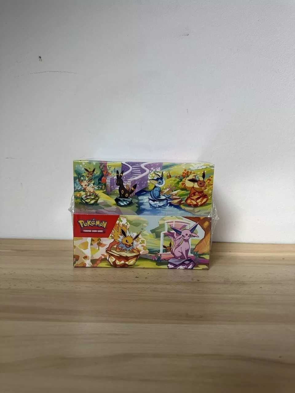 Pokemon TCG Prismatic Evolutions Mini Tin Display