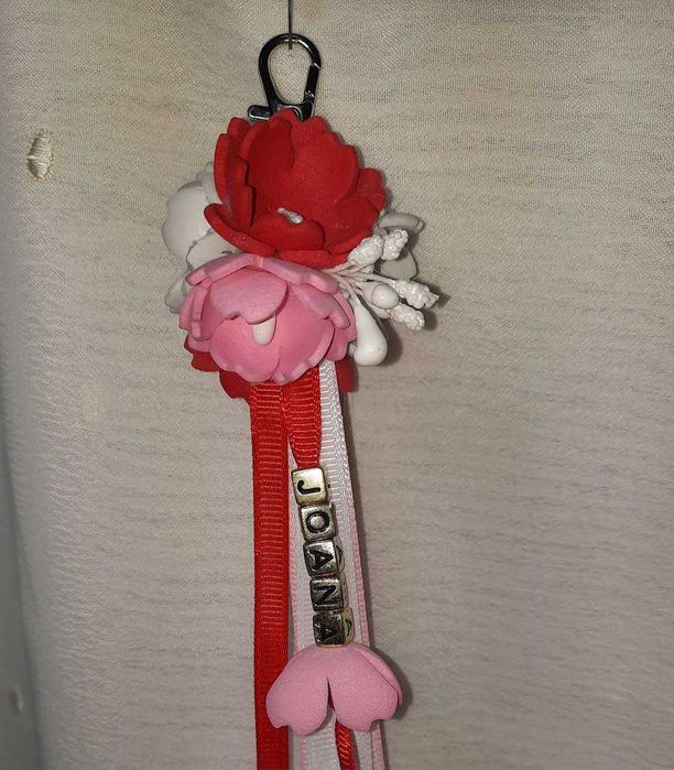 porta chaves ou um acessório para mala um presente lembrança