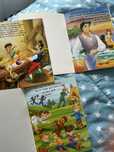 Livros, girassol e masha e o urso