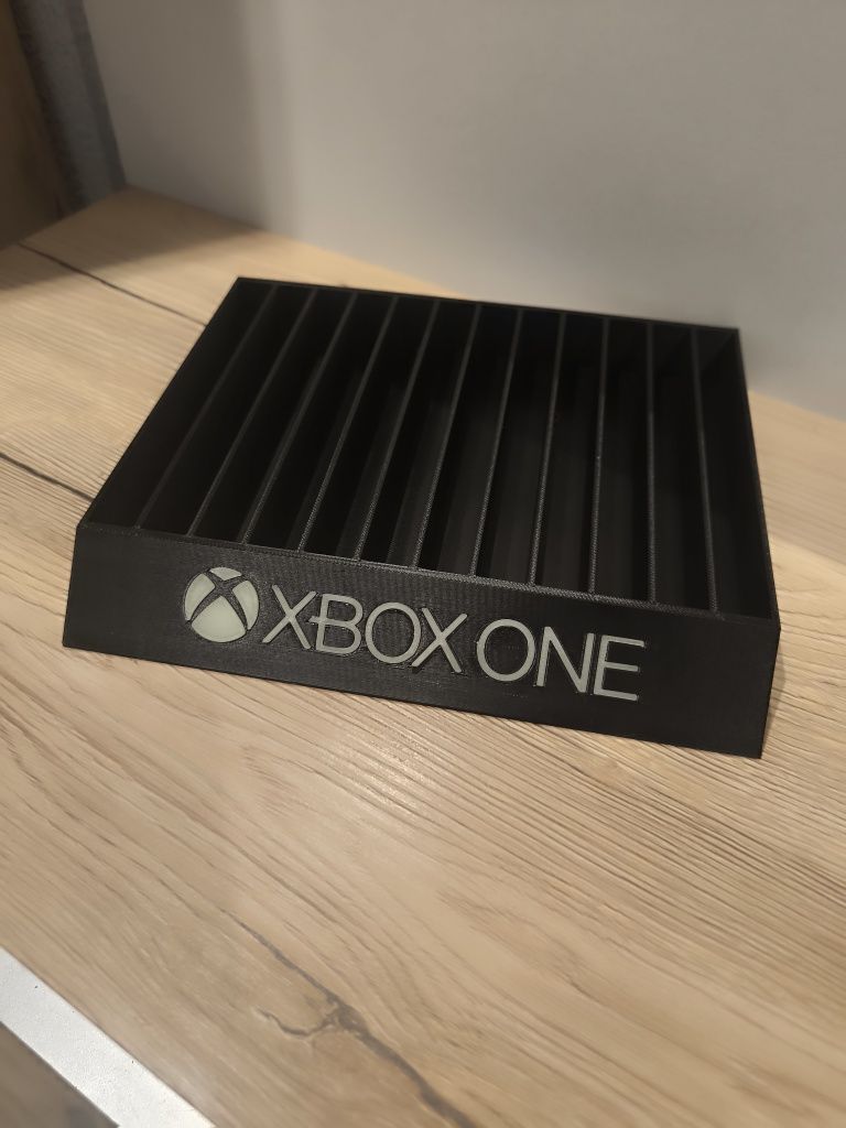 Stojak podstawka na gry Xbox One napis fluorescencyjny