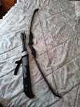 Arco recurvo com flechas